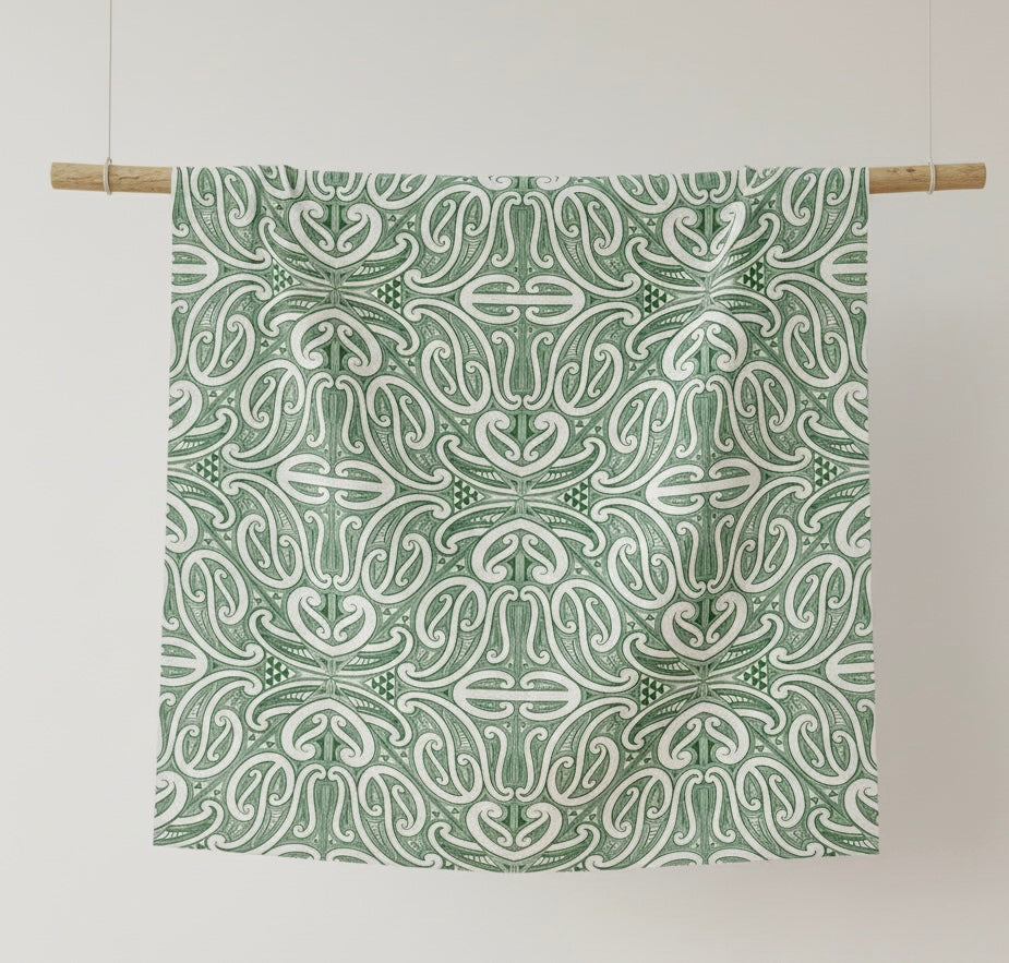Āhuru Swaddle in Pounamu colourway – Māori-inspired organic cotton baby swaddle by Hiwa & Awa Co.
